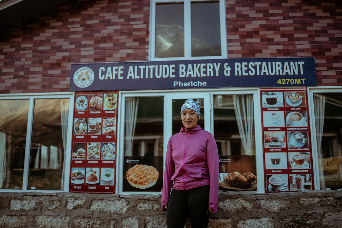 Ang Chhutin Sherpa outside Café Altitude Bakery ready for her morning run