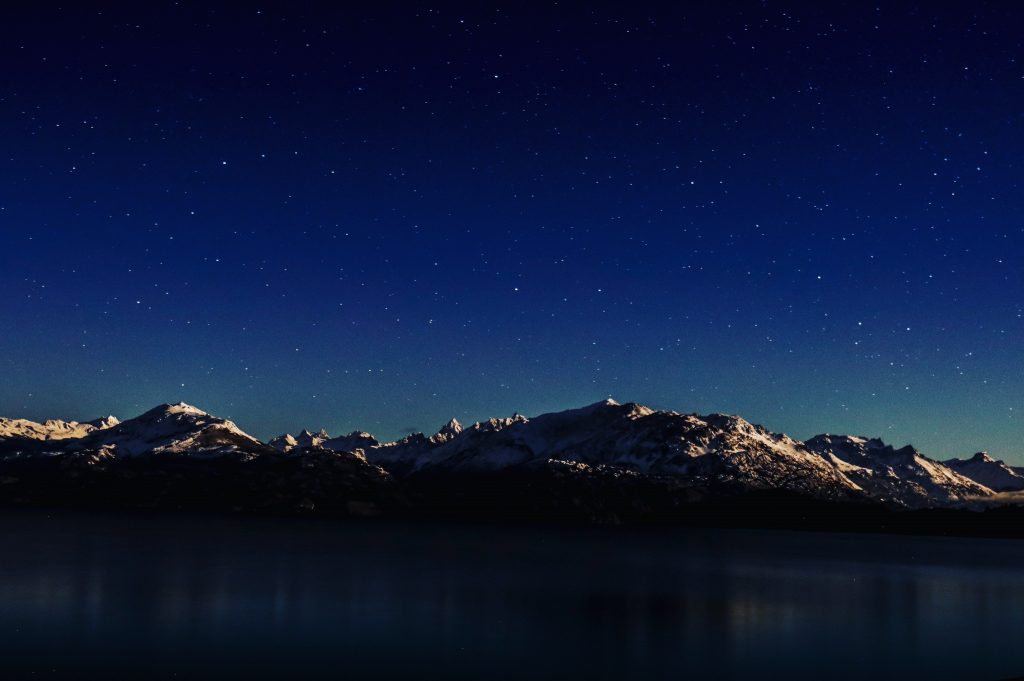 Chile New Patagonia Park Trail 3 Night sky over Chile's New Patagonia Park Trail, mountains in the distance.