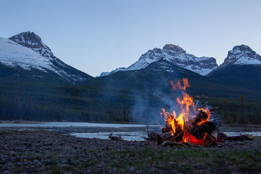 Modern Bushcraft in the Backcountry... or Backyard 2 Bonfire near mountain in British Columbia, Canada.